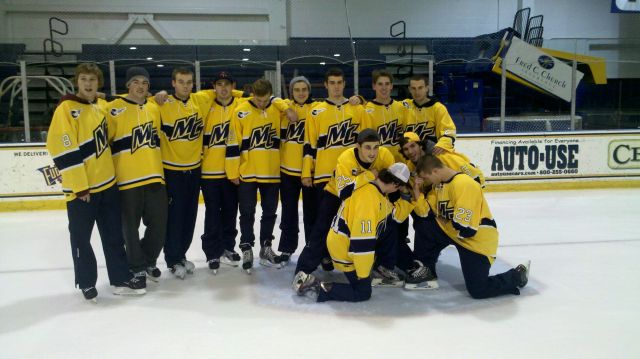 Sophomores Connor Toomey and Josh Myers "Tebowing" in a picture at the team's annual Skate with Santa event in December
